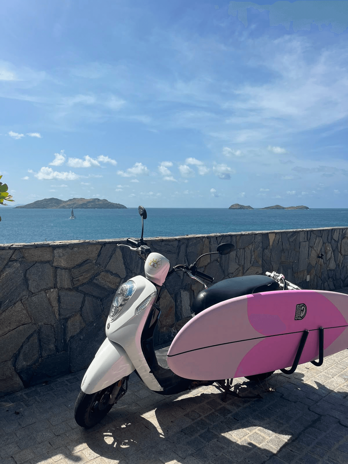 Timax Rental: scooter facing the Caribbean sea